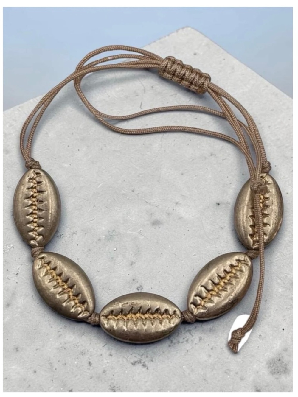 NWT Metallic Gold Adjustable Cowrie Bead Cord Bracelet